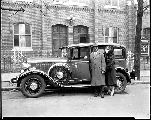 Dr. and Mrs. E.C. Smith w car